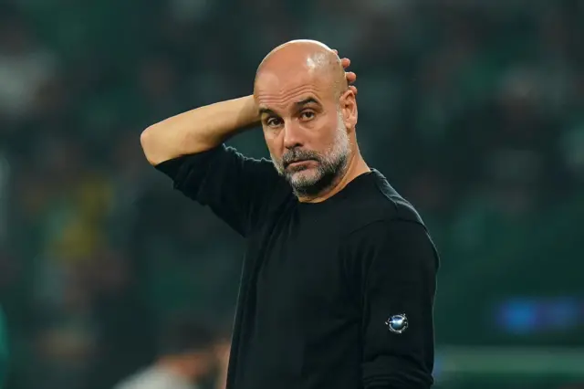 Manchester City manager Pep Guardiola looks on during the Champions League match