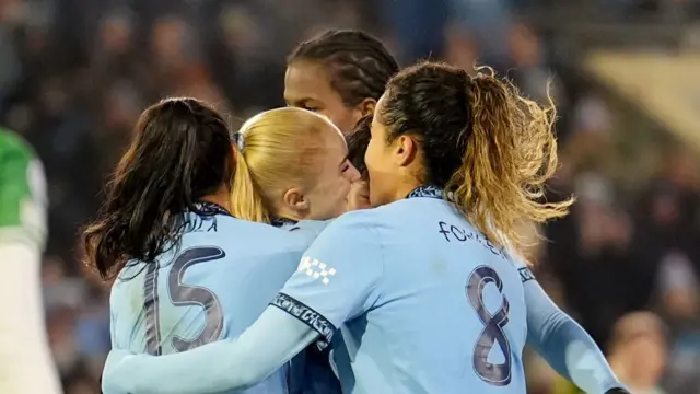 Manchester City players celebrate