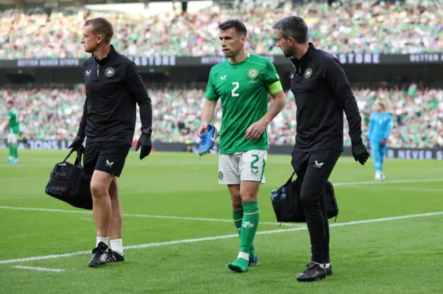 Seamus Coleman limps off during the Republic of Ireland's loss to England