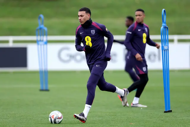 Morgan Rogers of England runs with the ball during a training session at St Georges Park