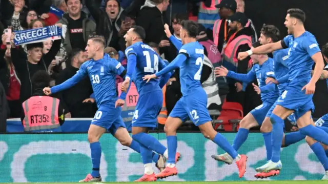 Vangelis Pavlidis of Greece celebrates after scoring against England