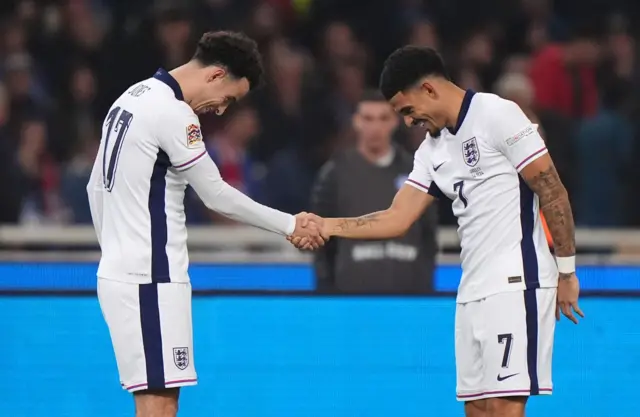 Jones and Gibbs-White shake hands after combining for the third England goal