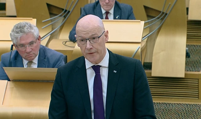 John Swinney answering qestions