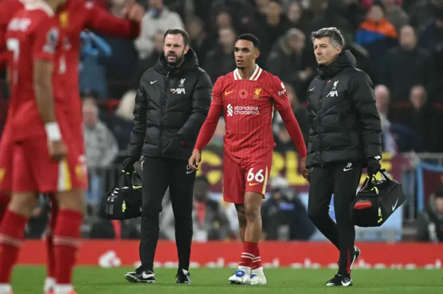 Trent Alexander-Arnold leaves the game after picking up an injury