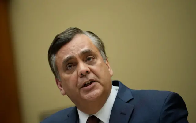 Headshot of Turley speaking