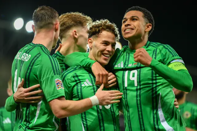 Northern Ireland celebrating Dion Charles' penalty