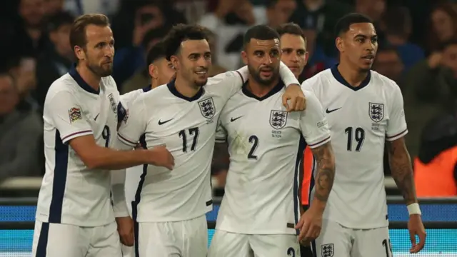 Curtis Jones of England celebrates scoring his team's third goal with teammates