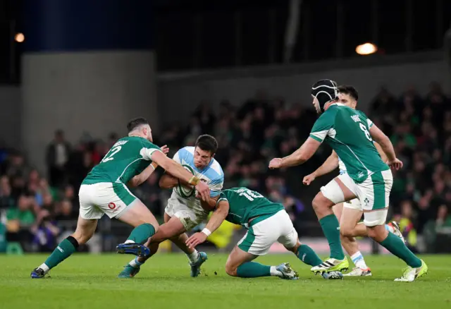 Ireland players tackle against Argentina