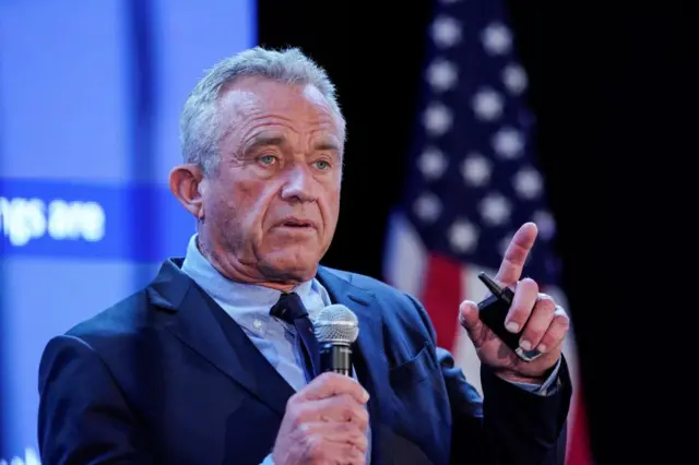 Robert F Kennedy Jr speaks to attendees during a press conference in New York