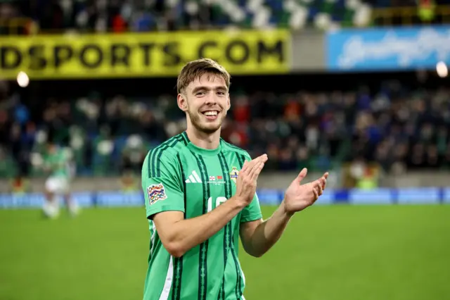 Ruairi McConville celebrating after the game