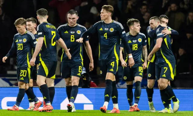 Scotland celebrate John McGinn's late goal at Hampden