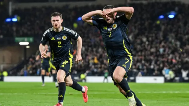 McGinn celebrates