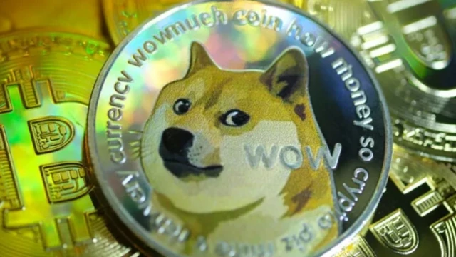 A dogecoin - a silver coin bearing the image of a dog meme