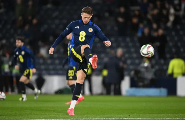 Scott McTominay warming up at Hampden