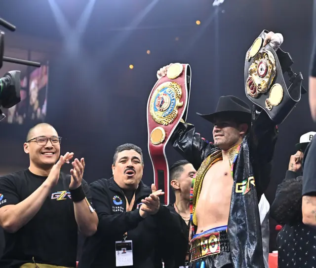 Gilberto Ramirez with his world titles