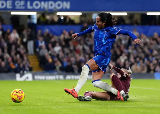 Greenwood slide tackles Ramirez fairly in the box