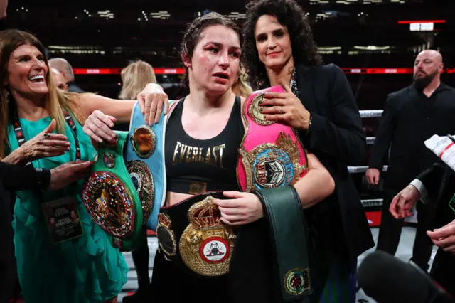 Katie Taylor holds her light-welterweight titles