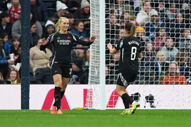 Blackstenius is congratulated by Mariona after scoring