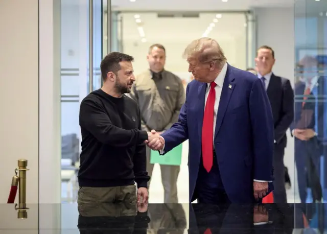 Ukrainian leader Volodymyr Zelensky shakes hands with Donald Trump at Trump Tower in New York on 27 September 2024