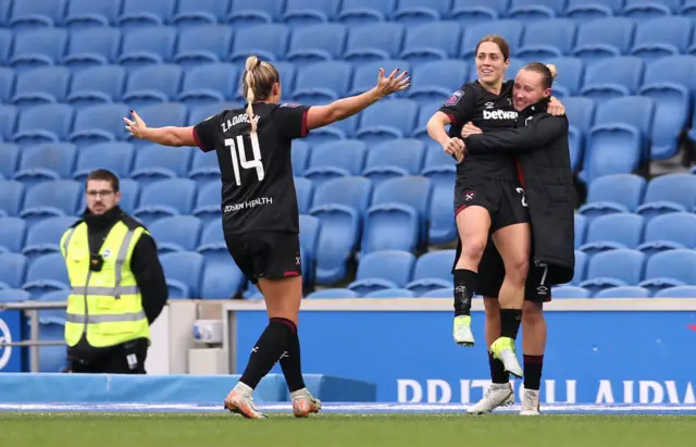 Gorry is lifted into the air by teammates as they celebrate her goal