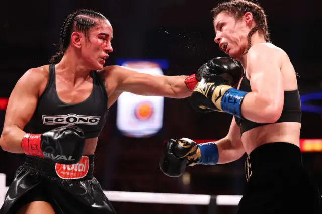 Amanda Serrano punches Katie Taylor