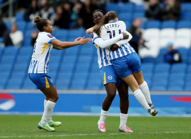 Brighton players celebrate Kirby's winning goal