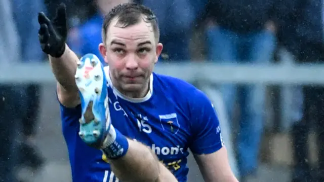 Jack McCarron scoring a point for Scotstown