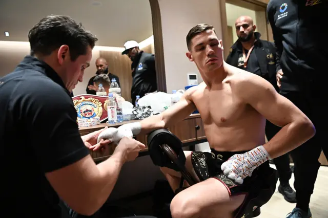 Shane McGuigan wrapping Chris Billam-Smith's hands