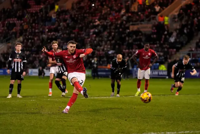 Ryan Cooney scores a penalty