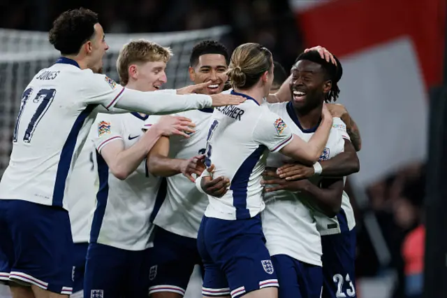 Conor Gallagher of England celebrates with teammates Curtis Jones, Anthony Gordon, Jude Bellingham and Marc Guehi