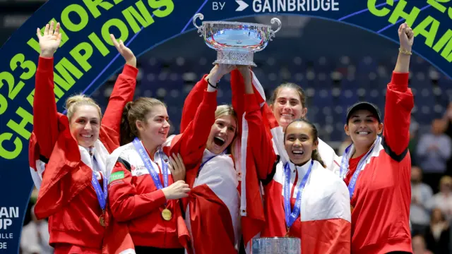 Canada raise the BJK Cup trophy