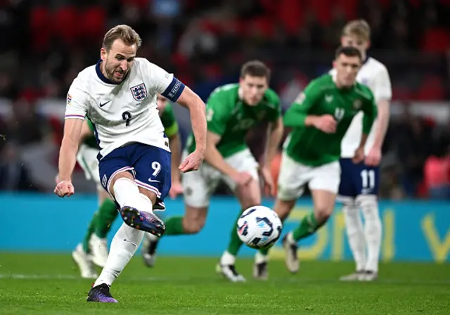 Harry Kane of England scores