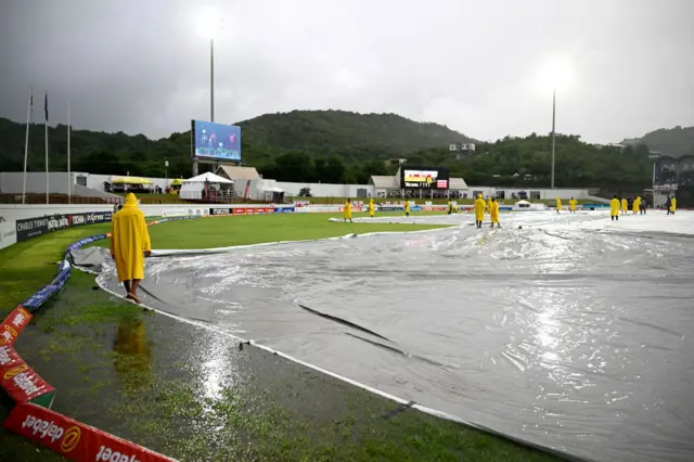 Daren Sammy Cricket Ground covers with rain on