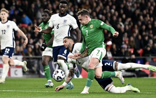 Republic of Ireland's Sammie Szmodics in action with England's Kyle Walker