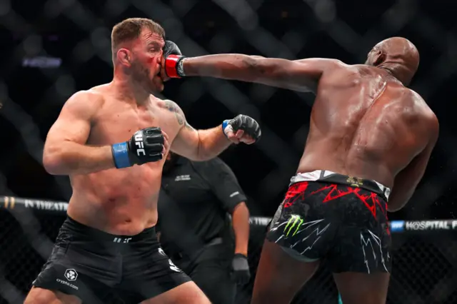 Jon Jones punches Stipe Miocic