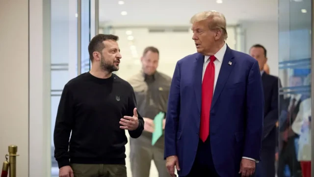 Zelensky and Trump walk side by side, chatting