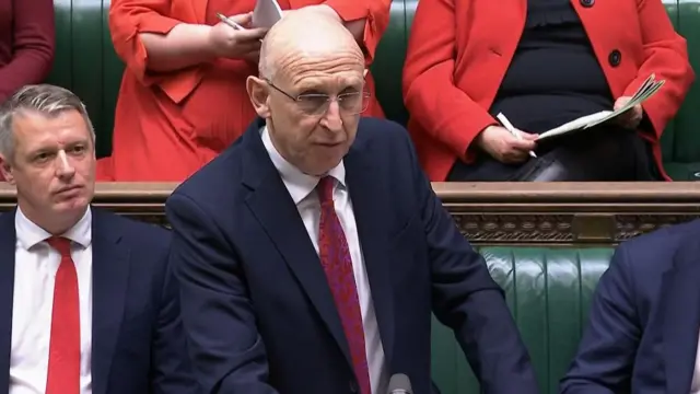 Healey addresses the House of Commons from the dispatch box