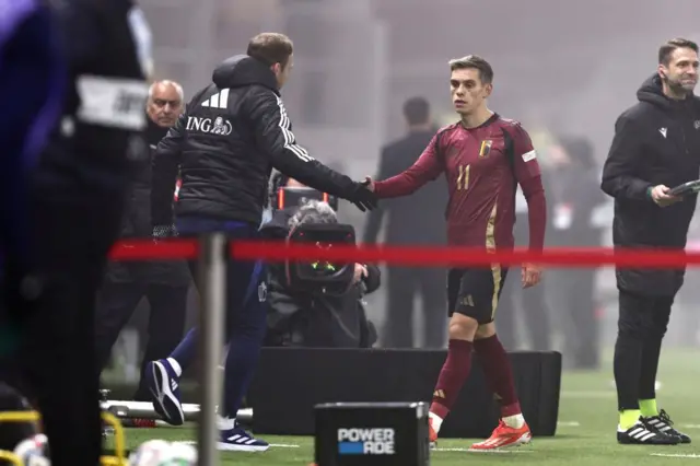 Arsenal forward Leandro Trossard hobbles off with injury during Belgium's 1-0 defeat to Israel.