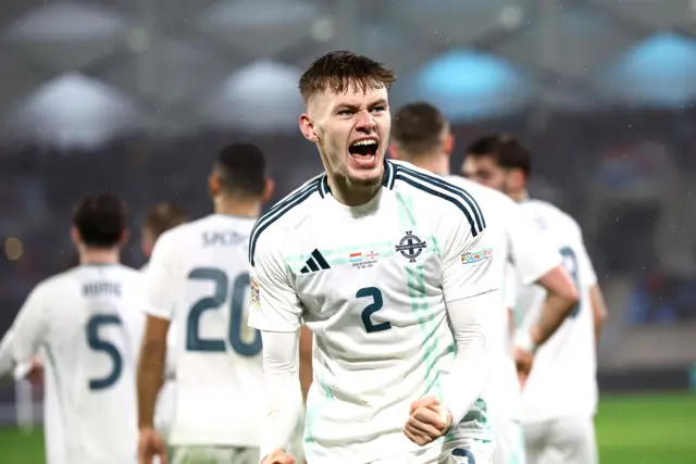 Northern Ireland's Conor Bradley celebrates scoring against Luxembourg