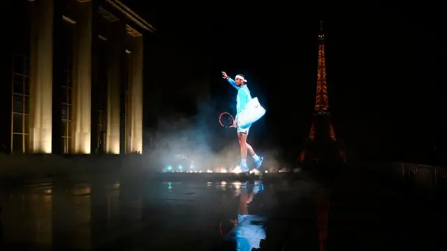 A projection showing Spanish tennis player Rafael Nadal with the Eiffel Tower in the background