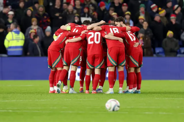 Wales players in a huddle