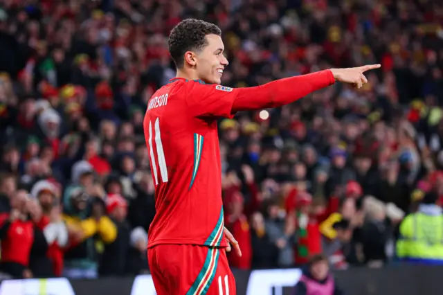 Wales' Brennan Johnson celebrates