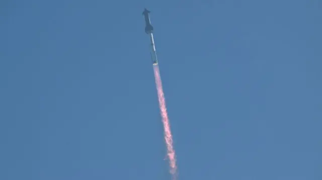 Long flames come out of the bottom of the rocket