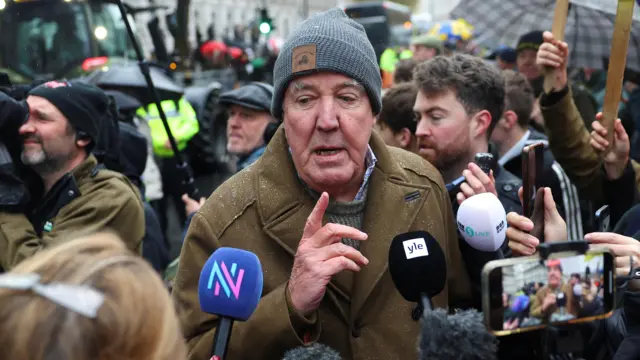 British television presenter and farm owner, Jeremy Clarkson speaks to the media during a demonstration protesting against the Labour government's new agricultural policy, which includes a budget measure expected to increase inheritance tax liabilities for some farmers, in London, Britain, November 19, 2024