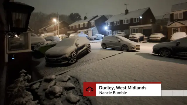 Cars, houses and roads covered in snow in a neighbourhood in Dudley, West Midlands.