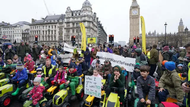 Children on toy tractors during a farmers protest in central London over the changes to inheritance tax (IHT) rules