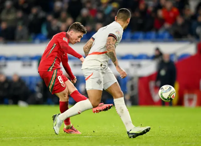 Wales' Harry Wilson scores