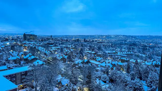 The view from high above Sheffield show snow covered rooftops