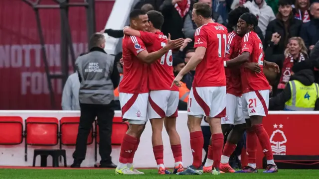 Nottingham Forest players celebrate after scoring against Newcastle United.
