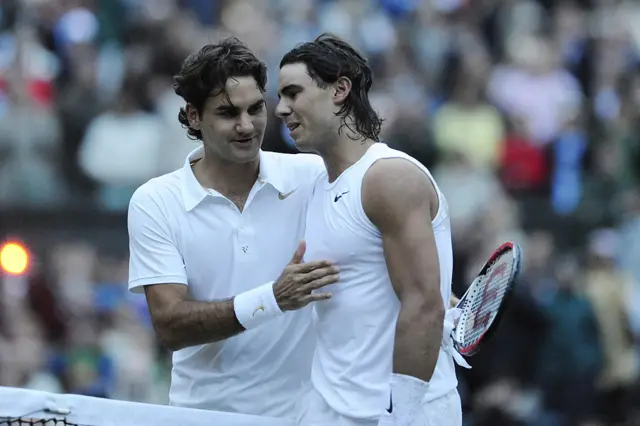 Roger Federer of Switzerland congratulates Rafael Nadal of Spain,